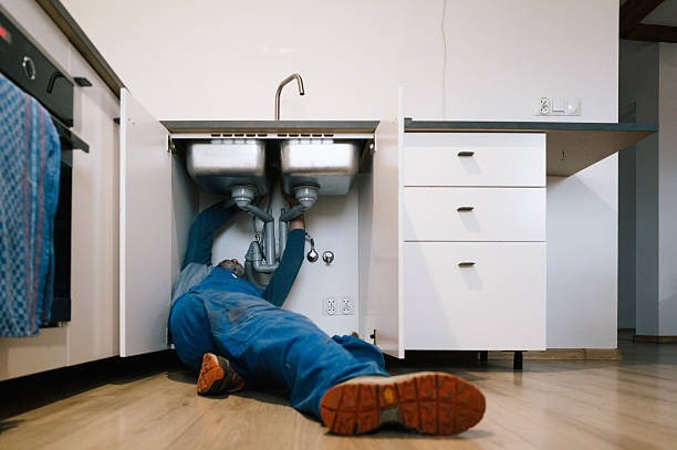 Professional Emergency Plumber technician working in Elk, WA